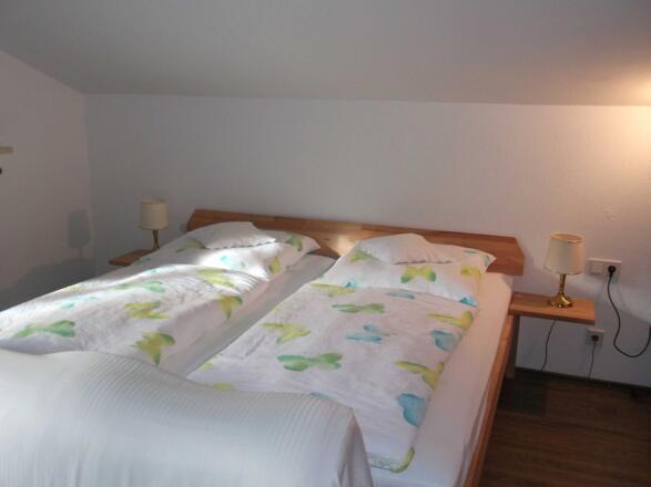 Ferienwohnung Haulle Kreuth am Tegernsee Schlafzimmer mit Doppelbetten
