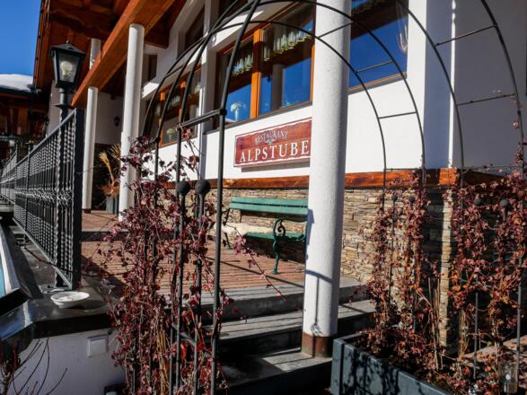 Eingang Restaurant Alpstube