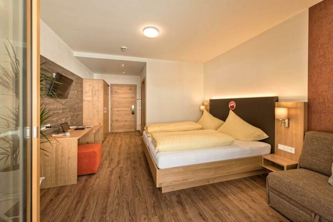 Hotel-Alpenfeuer-Montafon-Komfort-Doppelzimmer-Feu