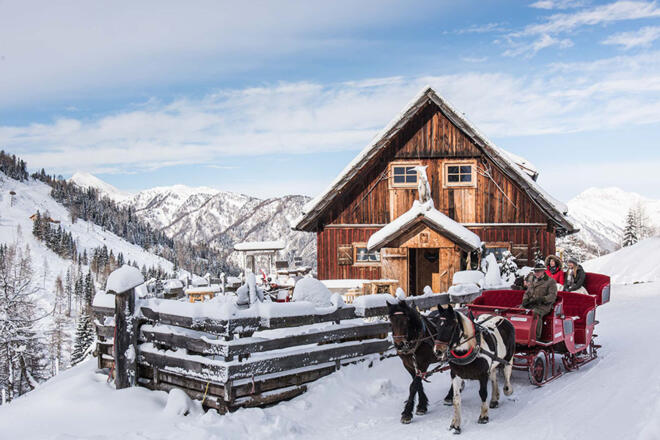 Pritzhütte im Winter mit Pferdeschlittenfahrt