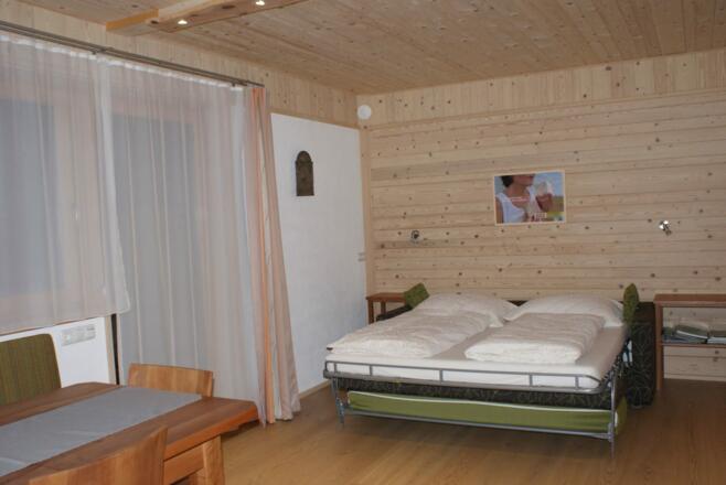 BERGULME - Zirben-Schlafzimmer mit Terrasse UG
