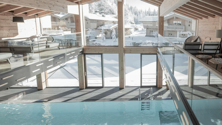 INNs HOLZ Chaletdorf mit INNs HOLZ See im Winter