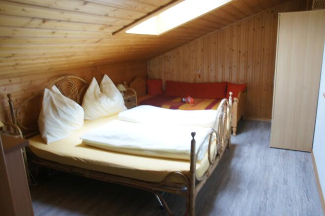 Schlafzimmer der Ferienwohnung Schlosspark