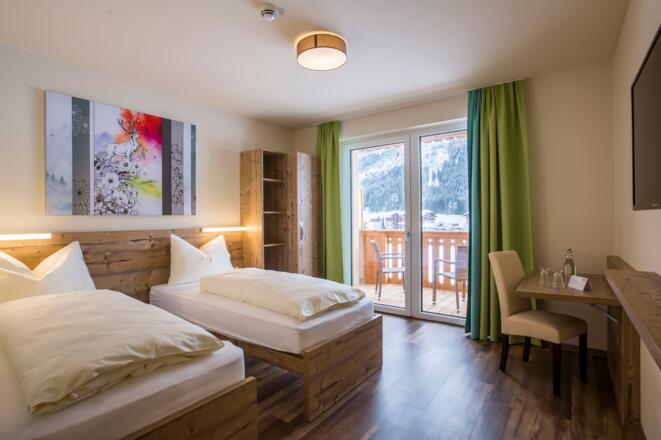 COOEE alpin Hotel Dachstein Doppelzimmer mit Twinbetten