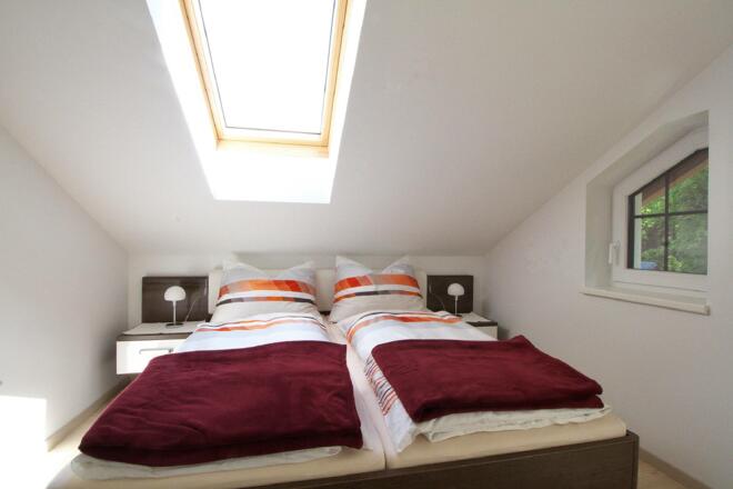 Schlafzimmer mit Balkon