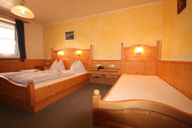 Doppelzimmer Gästehaus mit Zusatzbett