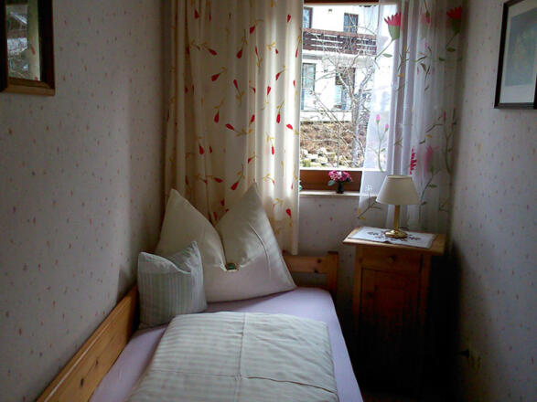 Schlafzimmer Ferienwohnung Bergblick