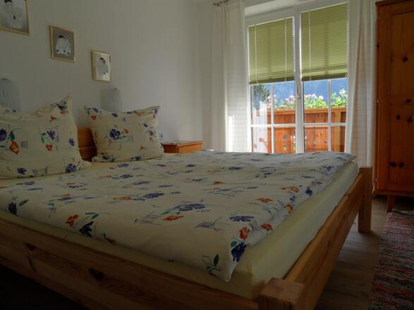 Schlafzimmer mit Balkon