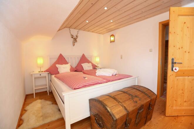 Schlafzimmer mit bequemen Betten