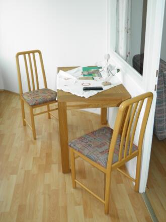 Gemütlicher Sitzplatz im Lavendelzimmer
