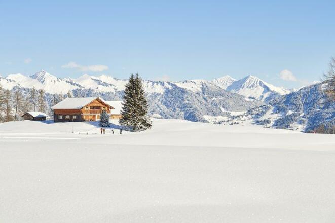 Tschengla und Alpe Rona verschneit im Winter (c) A