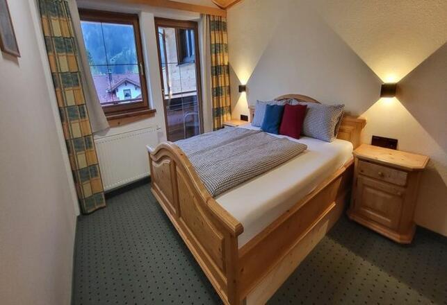 Schlafzimmer grün Ferienwohnung Tanne