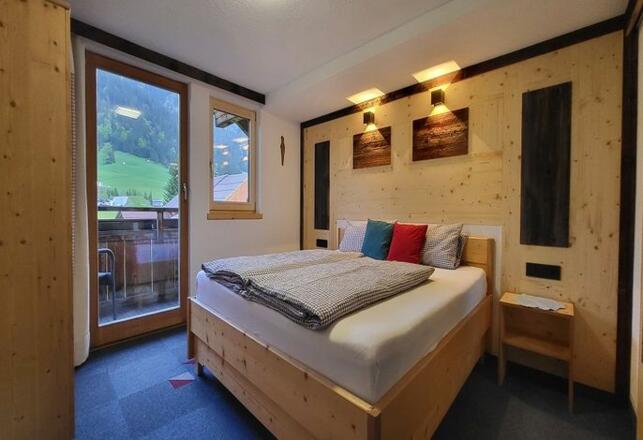 Schlafzimmer blau Ferienwohnung Tanne