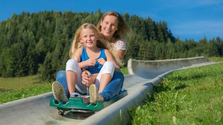 100 % Spaß-Garantie für die ganze Familie auf der Sommerrodelbahn am Biberg in Saalfelden