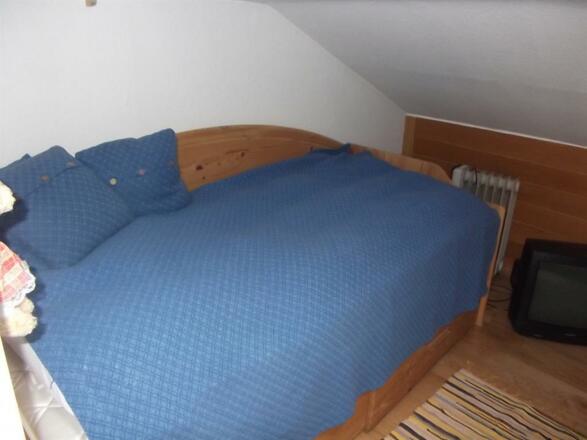 Einzelbett im Schlafraum 1