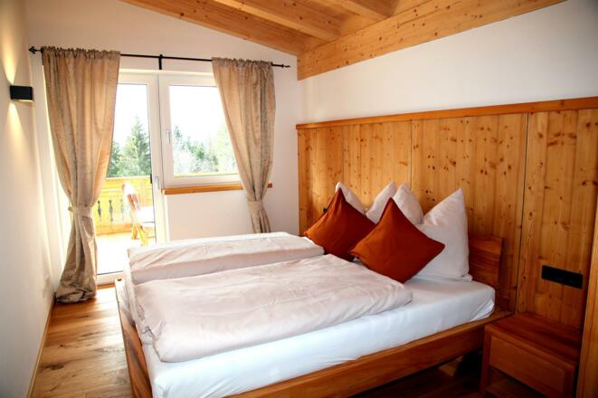 Schlafzimmer in der Ferienwohnung Grubertal