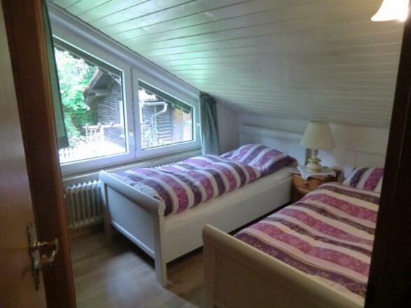 Wohnung 1 Hinteres Schlafzimmer