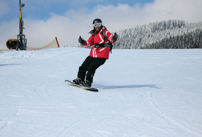 Kessel Alm im Winter: Snowboard Fahrer