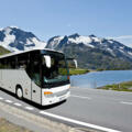 white-bus-crossing-the-alpes-picture-id157526603