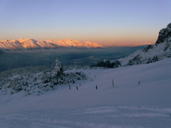Die letzten Sonnenstrahlen beim Blick in das Unterinntal