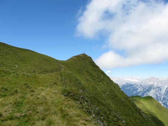 Der unscheinbare Gipfel des Rauhen Kopf. Vorsicht hier bei Nässe!