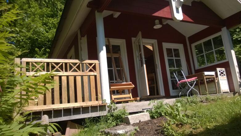 Blockhütte mit Terrasse