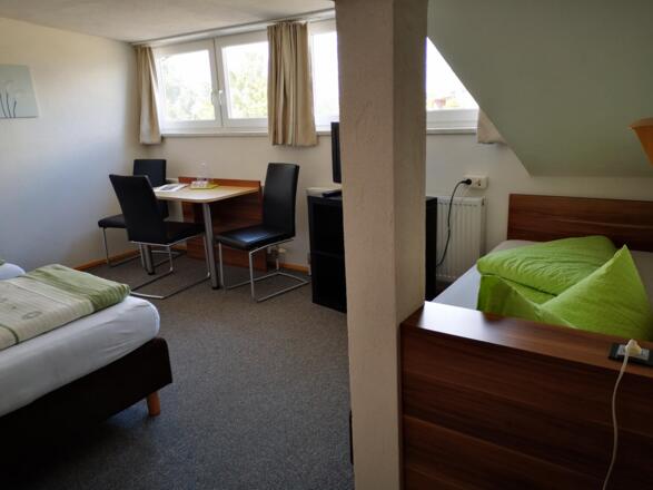 Unsere Dreibett Zimmer